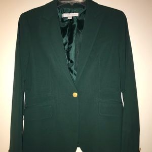 Green blazer with gold buttons
